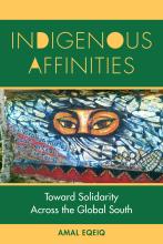 A book with a green and yellow cover, featuring a mural with person's eyes surrounding by an intricate gray pattern, Indigenous symboling, as well as flowers and a corn in the corner.