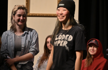 A young adult smiling.