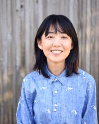 Frontal shot of Ellen Chang in light blue shirt with white dinosaur print
