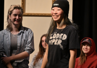 A young adult smiling.